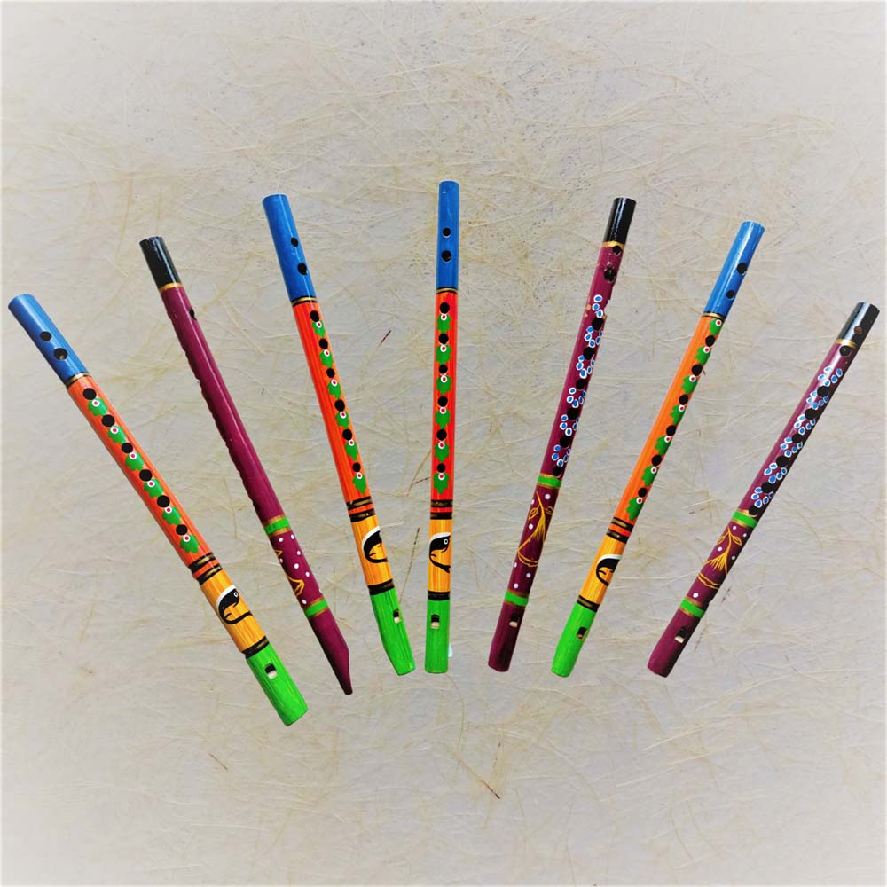 Set of seven colorful hand-painted wooden flutes displayed in a fan-like arrangement.