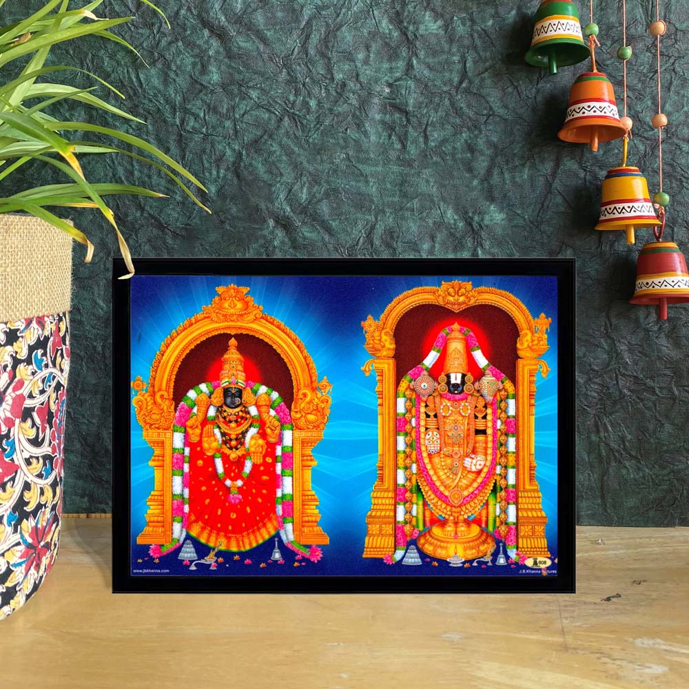 Traditional art frame featuring Lord Perumal and Goddess Thayar in a Tanjore-style design with vivid colors and golden arches.