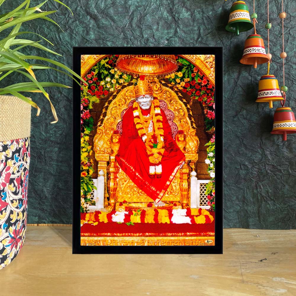 Sai Baba seated on a golden throne with red attire, surrounded by floral decorations, symbolizing peace and blessings.