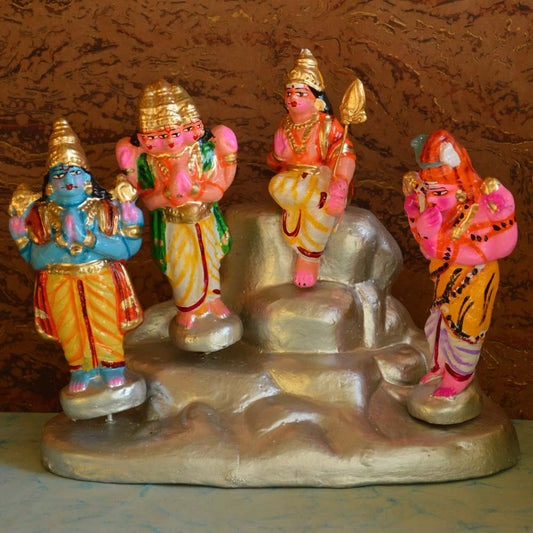 Handcrafted Navarathri Golu Dolls Murugar Upadesam Set with vibrant figurines of Lord Muruga and devotees on a silver rocky mount.