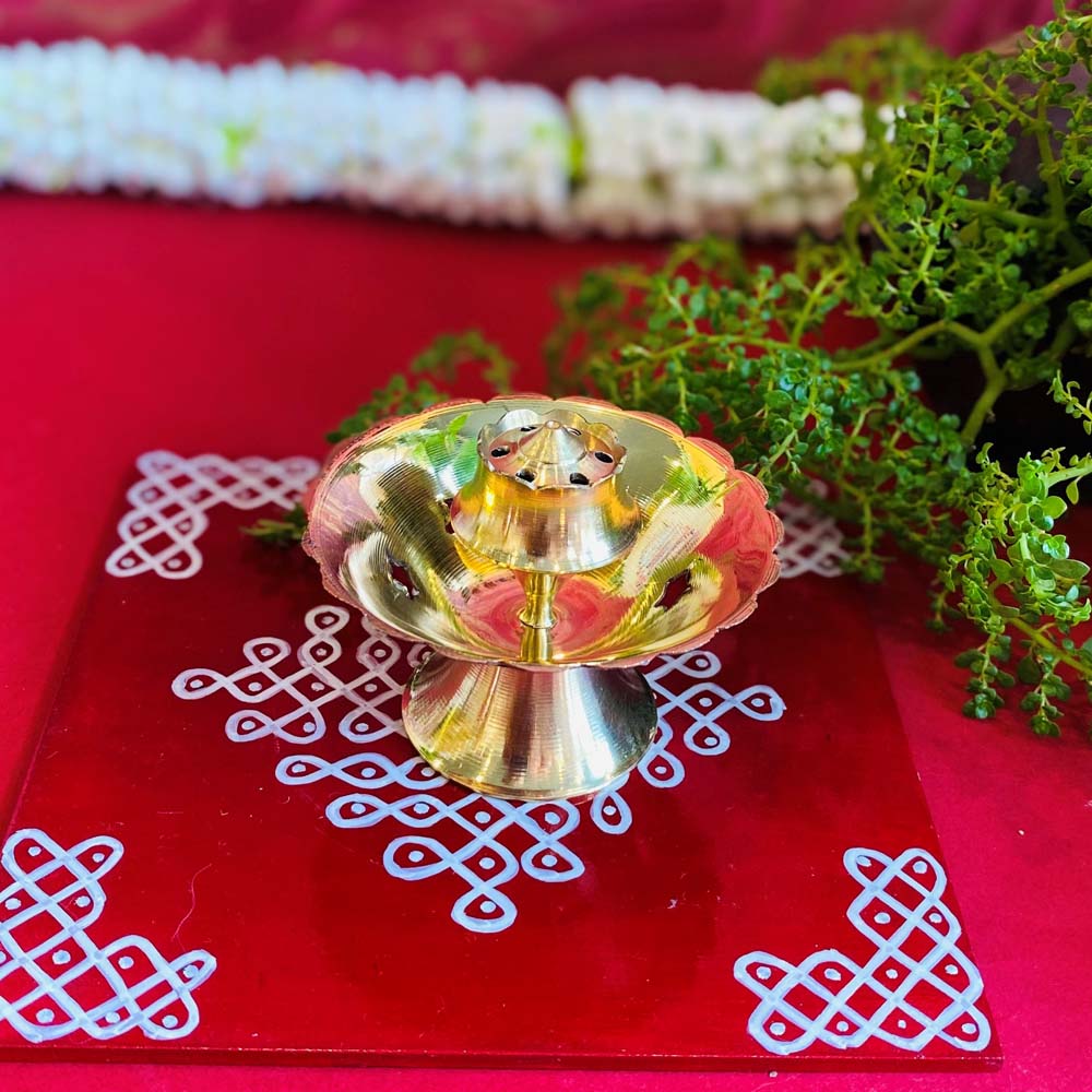 Eternal Brass Incense Holder with floral design and polished finish.