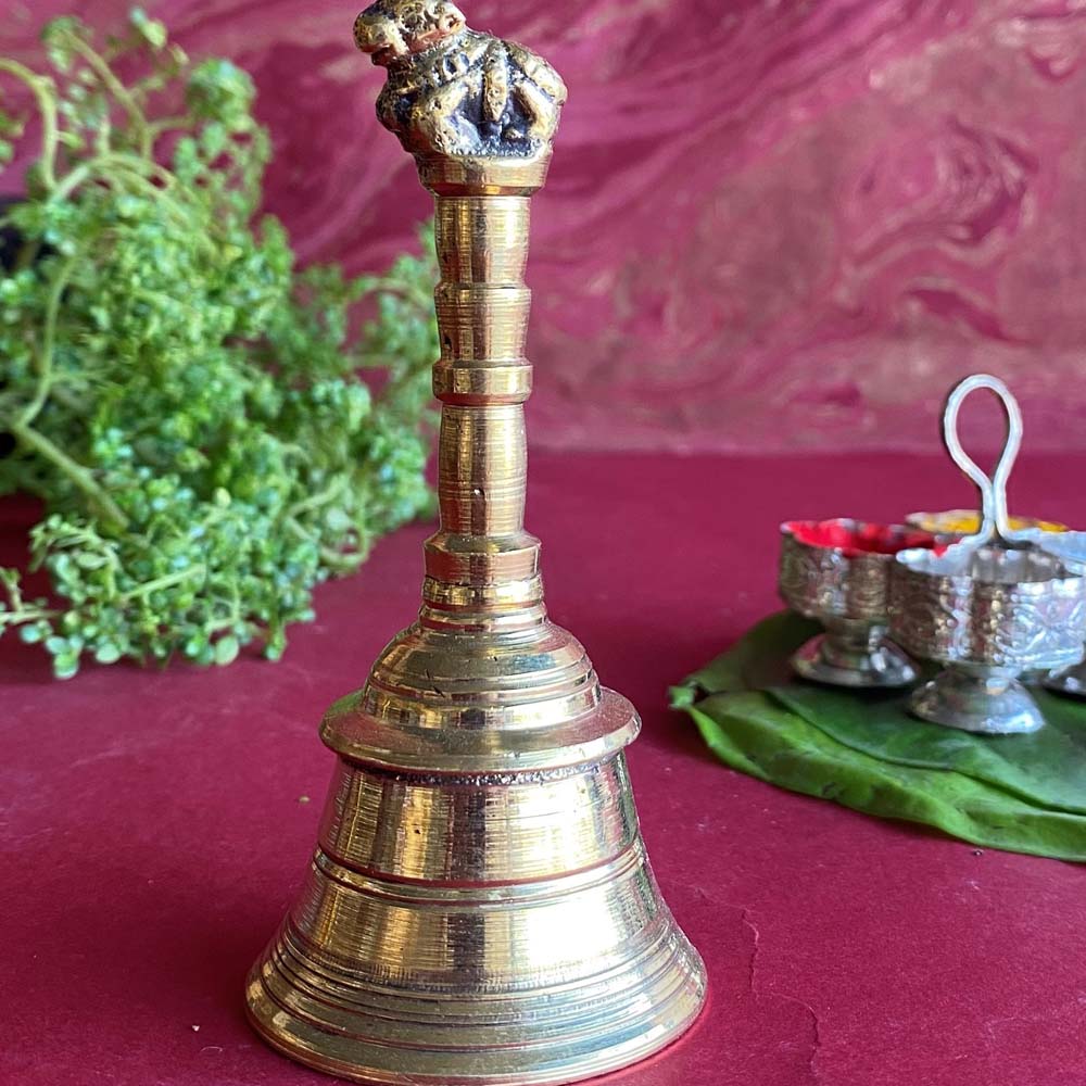 Eternal Bell Nandhi Big with brass finish, featuring an intricate Nandi sculpture on top, ideal for puja rituals.