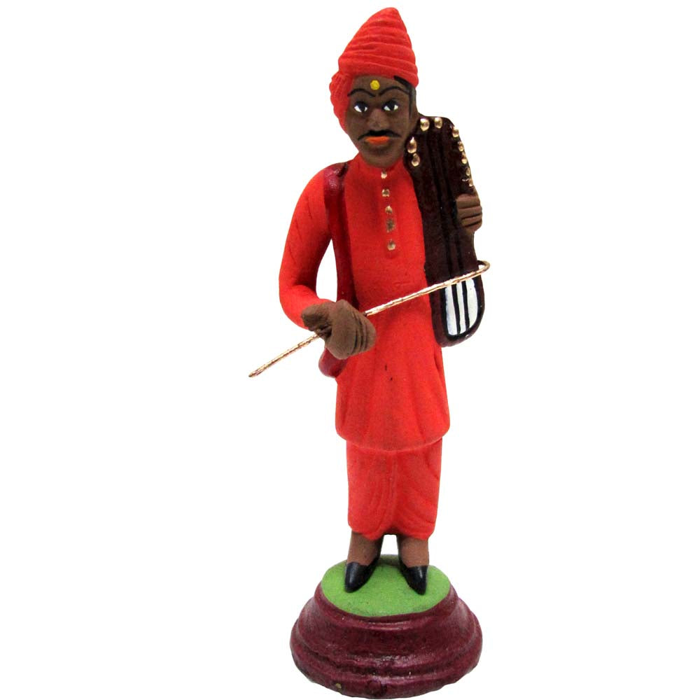 Handcrafted Miniature Folk Musician Figurine in red attire holding a traditional musical instrument.