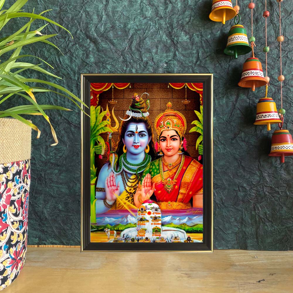 Framed artwork of Lord Shiva and Goddess Parvati with Shiva Lingam, radiating divine harmony.