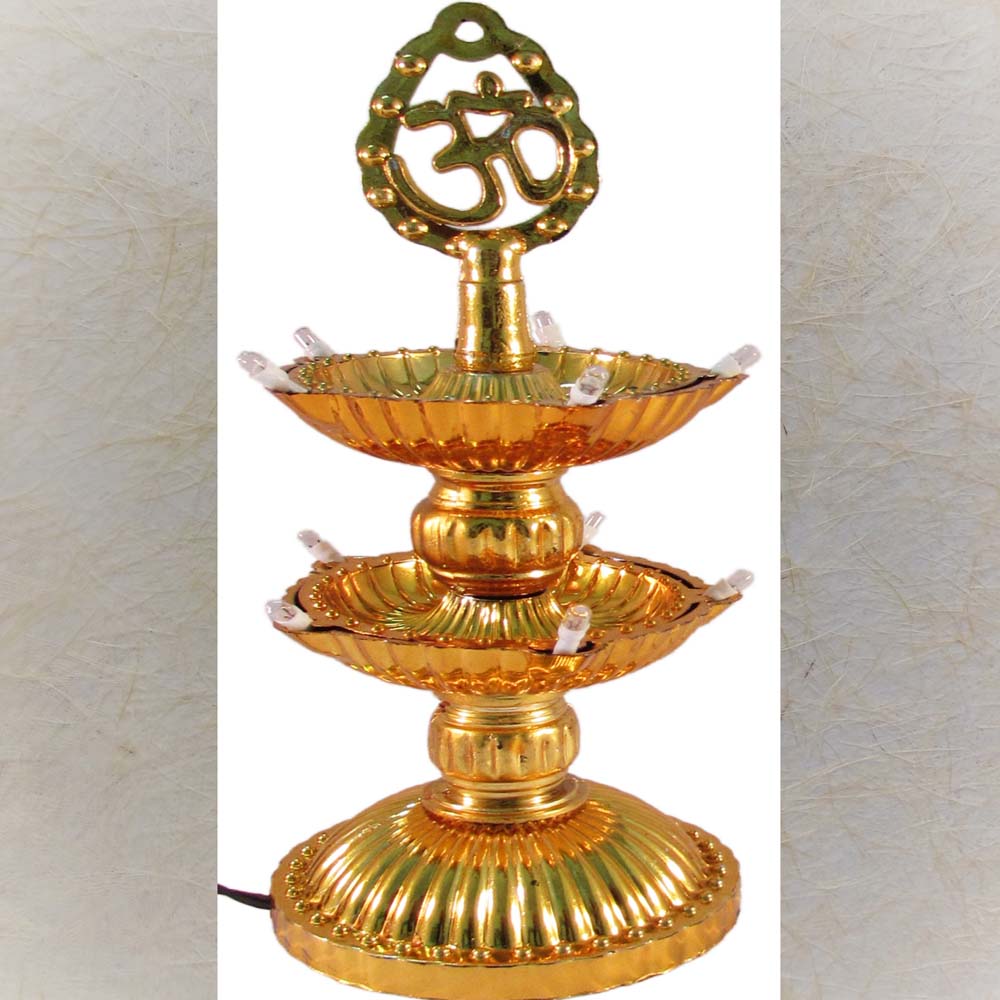 Fancy Kuthu Vilakku brass lamp with electrical bulbs, 3-tier design, and Om symbol on top, perfect for festive decor and rituals.
