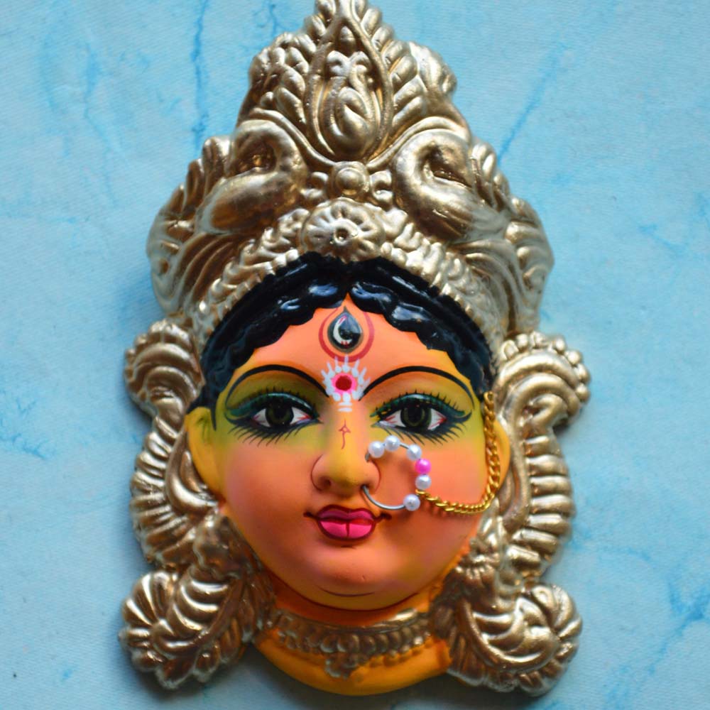 Handcrafted Durga Face wall hanging, intricately detailed and vibrantly painted, ideal for Navaratri Golu display and home decor.