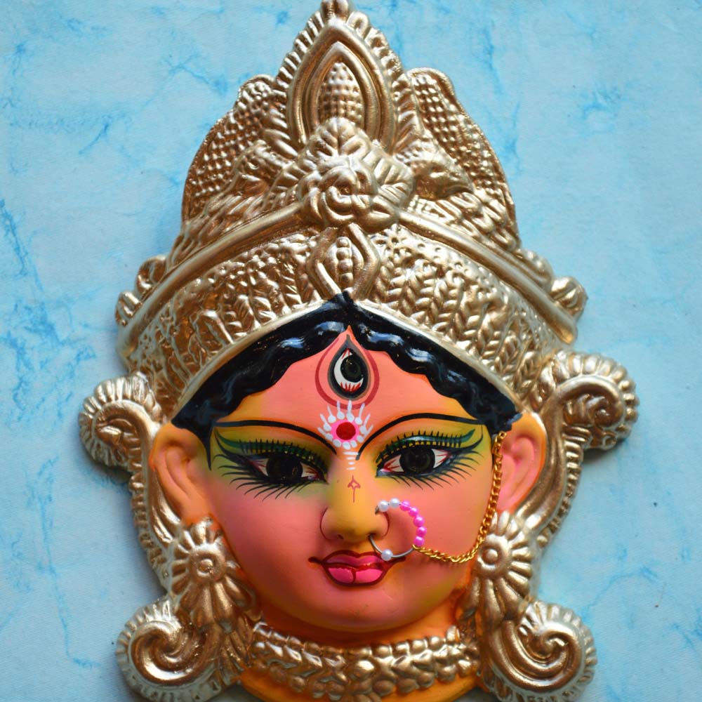 Handcrafted Durga Face wall hanging, intricately detailed and vibrantly painted, ideal for Navaratri Golu display and home decor.