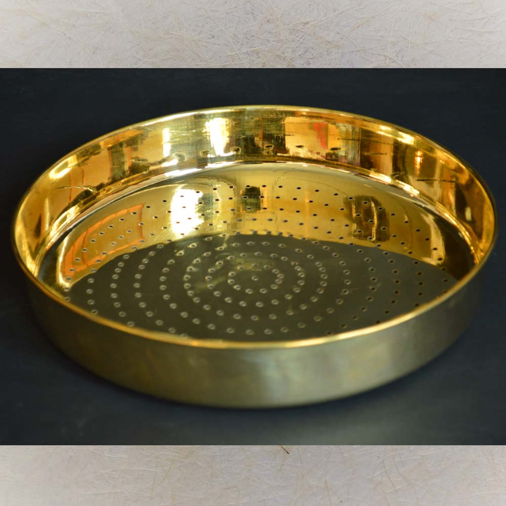 Eternal Abhishekam Jali Plate in brass with spiral perforated design.