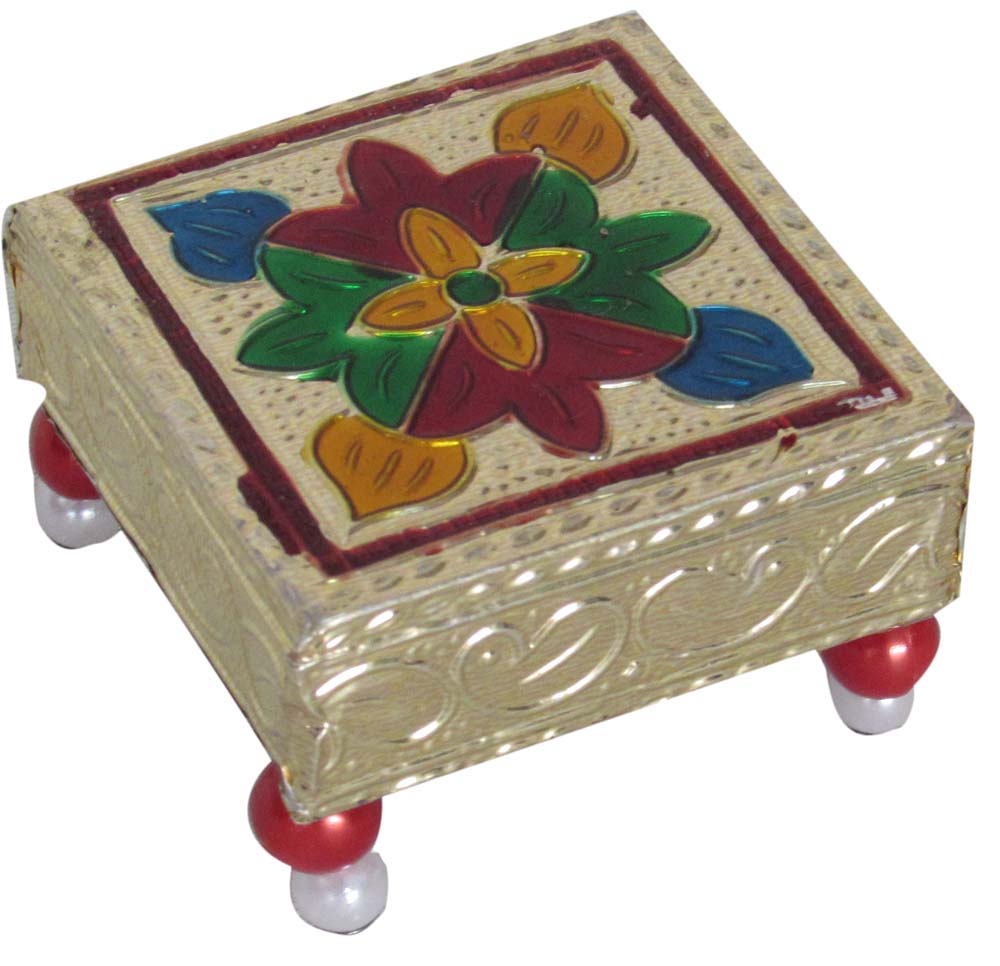 Decorative stool with plastic bead legs and golden floral design.