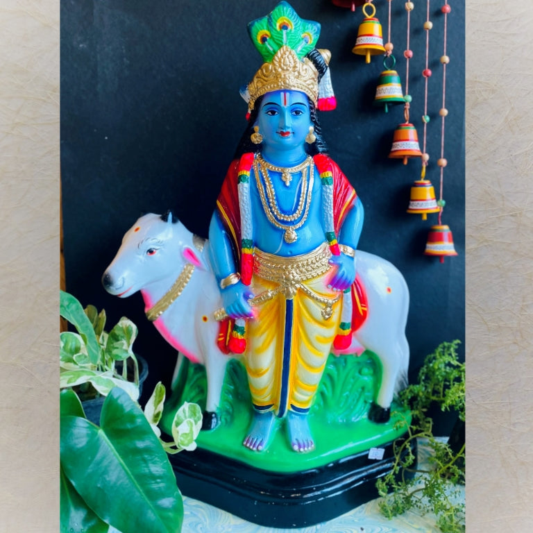Handcrafted Krishna with Cow Navaratri Golu Doll featuring vibrant colors and intricate craftsmanship, ideal for festive decor.