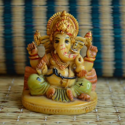 Enchanting Ganesha Idol – Painted Marble Finish With Modak & Mushak