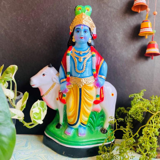 Handcrafted Krishna with Cow Navaratri Golu Doll featuring vibrant colors and intricate craftsmanship, ideal for festive decor.