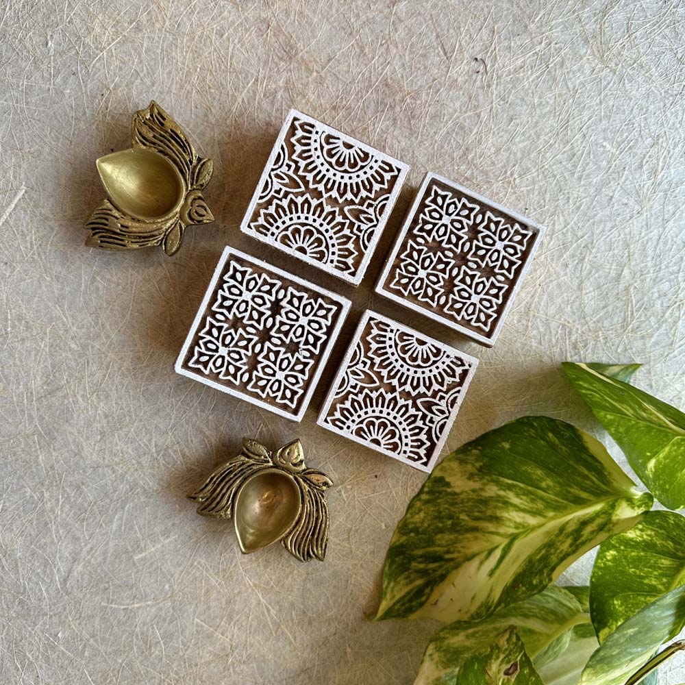 Hand-Carved Wooden Block Incense Holder Set with Floral Patterns and Brass Leaf-Shaped Accents.