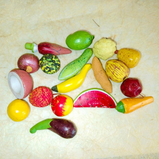 Set of 18 small handcrafted and hand-painted clay fruits for Navarathri Golu display.