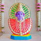 Handcrafted Navarathri Golu doll of Goddess Renugammal with a vibrant gold and green decorative backdrop.