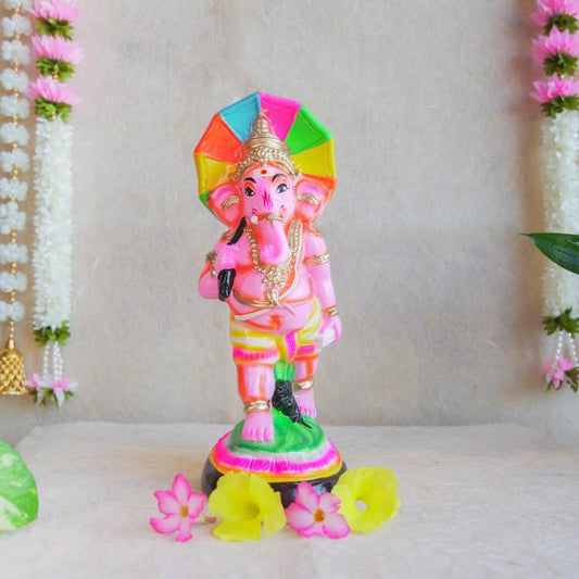 Handcrafted Navarathri Golu doll of Lord Ganesh with a vibrant multicolored umbrella, ideal for festive decorations.