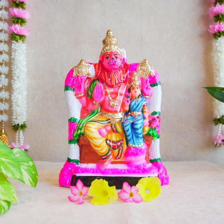Handcrafted Navarathri Golu doll of Lakshmi Narasimha, featuring vibrant colors and intricate details, ideal for festive decoration.