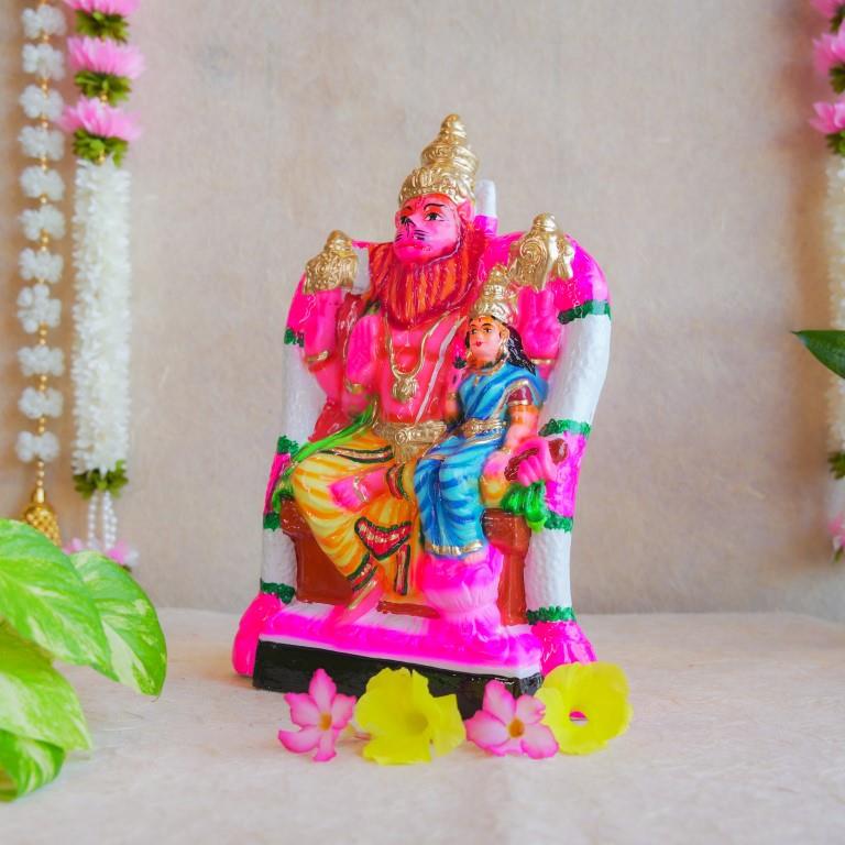 Handcrafted Navarathri Golu doll of Lakshmi Narasimha, featuring vibrant colors and intricate details, ideal for festive decoration.