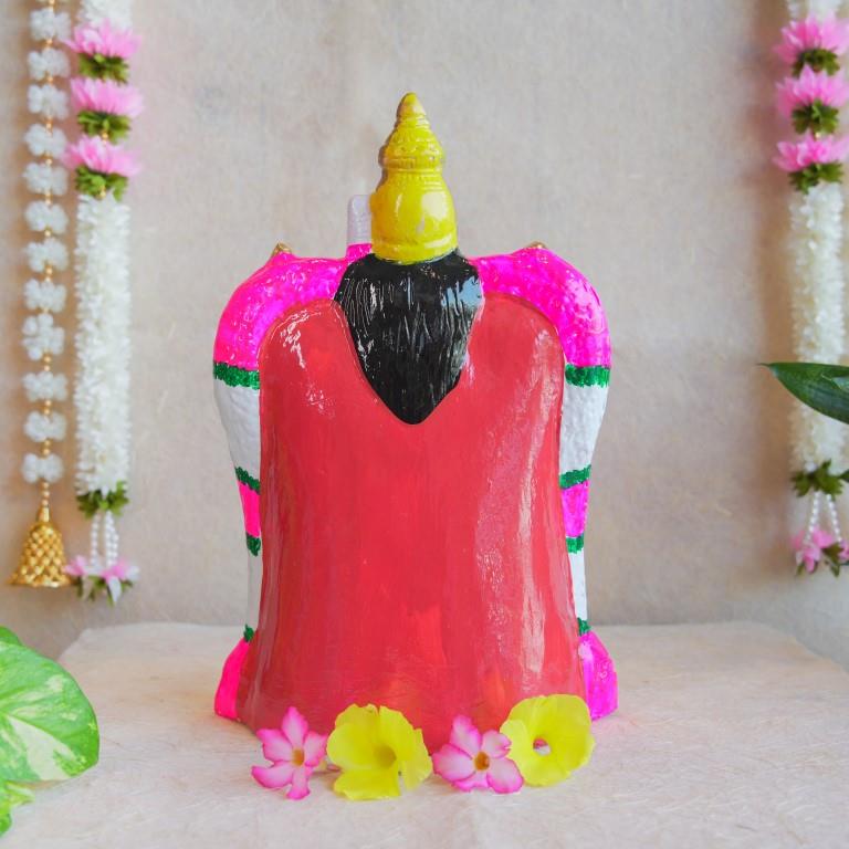 Handcrafted Navarathri Golu Dolls featuring Lord Vishnu and Goddess Lakshmi seated on a decorated throne.