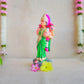 Handcrafted Navarathri Golu Doll of Vastu Lakshmi adorned in a vibrant green saree with intricate detailing, blessing devotees.