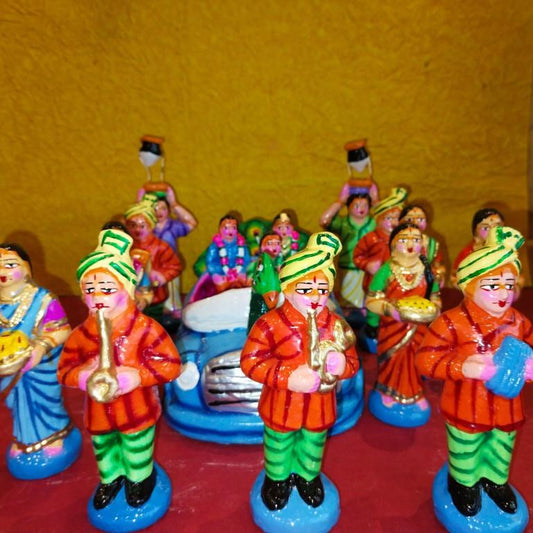 Handcrafted Navarathri Golu Marriage Car Procession Set featuring a peacock-adorned car, musicians, bridesmaids, and relatives in vibrant colors.