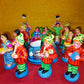 Handcrafted Navarathri Golu Marriage Car Procession Set featuring a peacock-adorned car, musicians, bridesmaids, and relatives in vibrant colors.