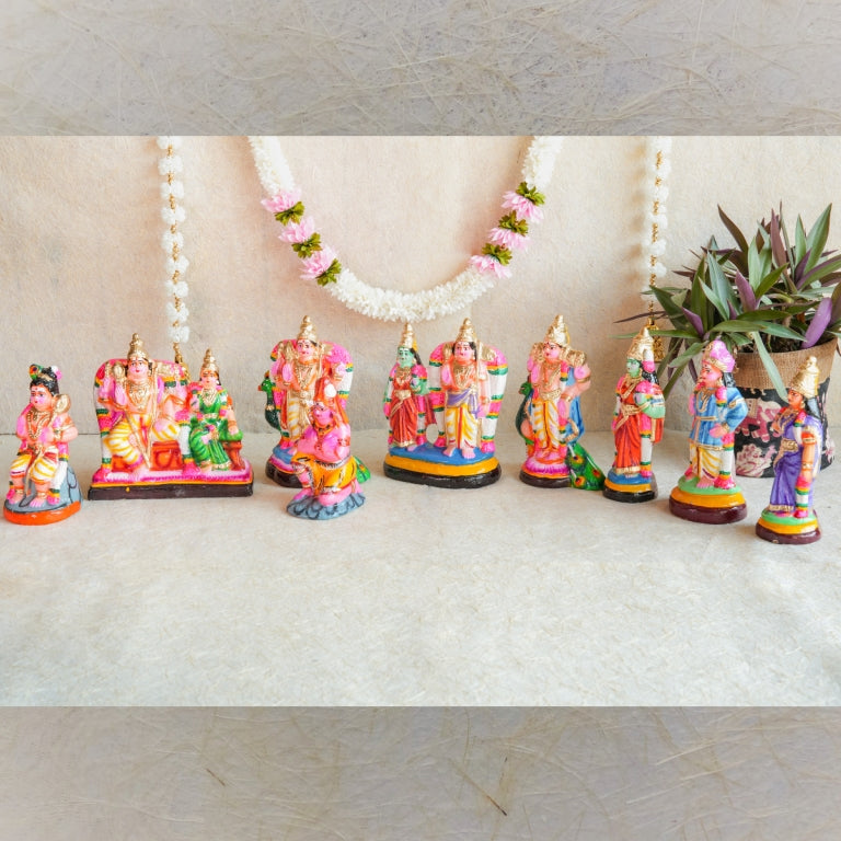 Handcrafted Arupadai Veedu Navaratri Golu Doll Set showcasing Lord Murugan in his six abodes with Valli and Deivayanai, vibrantly colored and intricately detailed.