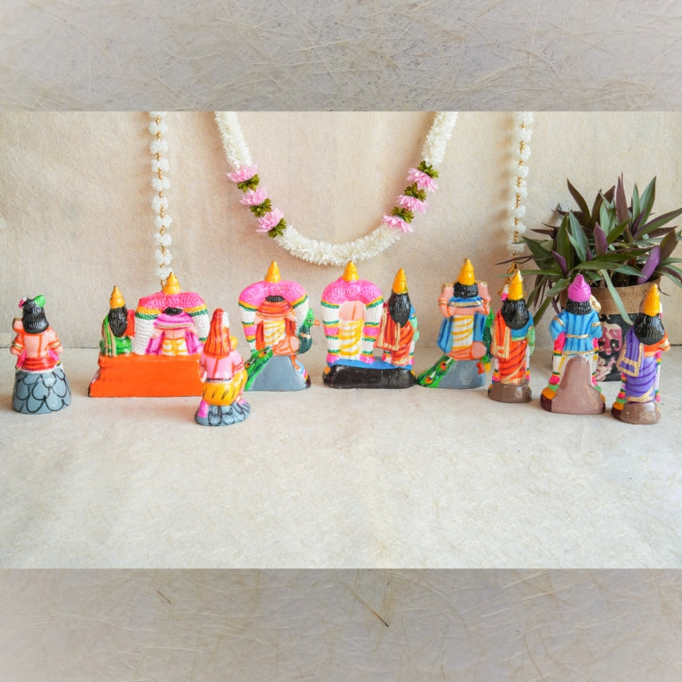 Handcrafted Arupadai Veedu Navaratri Golu Doll Set showcasing Lord Murugan in his six abodes with Valli and Deivayanai, vibrantly colored and intricately detailed.