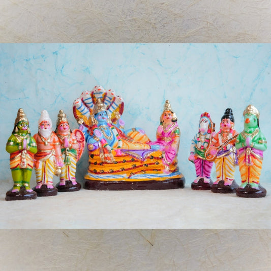 Handcrafted Vaikuntam Navaratri Golu Doll Set featuring Lord Vishnu reclining on Adisesha with Goddess Lakshmi and celestial devotees, vibrantly painted and detailed.