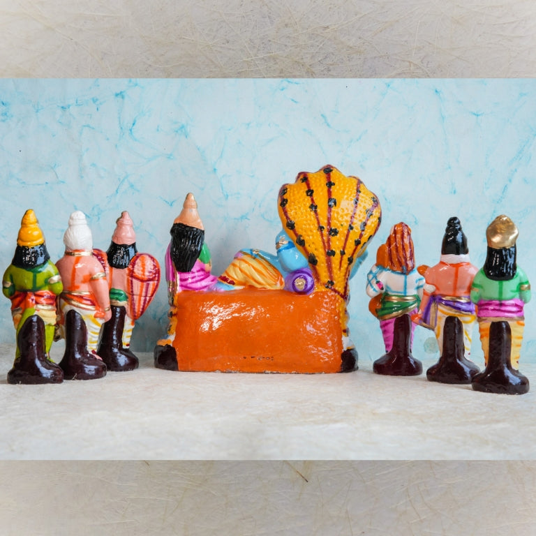 Handcrafted Vaikuntam Navaratri Golu Doll Set featuring Lord Vishnu reclining on Adisesha with Goddess Lakshmi and celestial devotees, vibrantly painted and detailed.