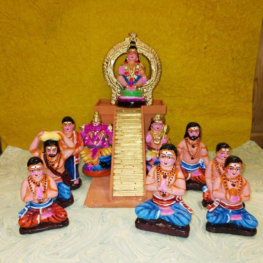 Handcrafted Ayyappan Poojai Navaratri Golu Doll Set with Lord Ayyappa seated on a pedestal and devotees performing rituals, vibrantly painted and intricately detailed.