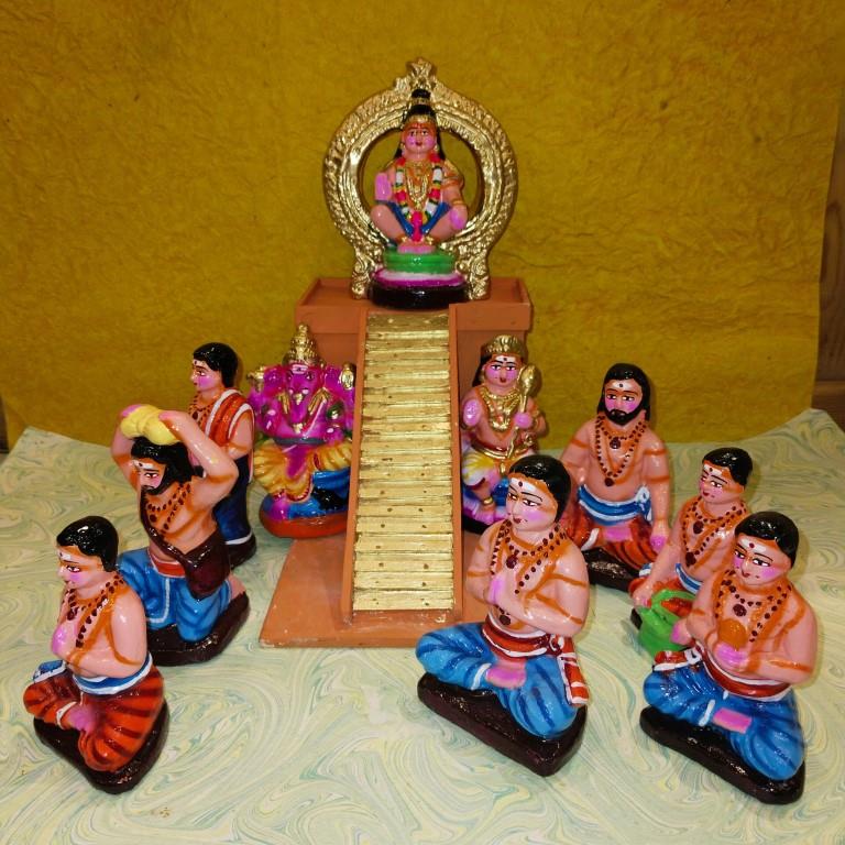 Handcrafted Ayyappan Poojai Navaratri Golu Doll Set with Lord Ayyappa seated on a pedestal and devotees performing rituals, vibrantly painted and intricately detailed.