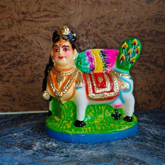 Handcrafted Kamadhenu Navaratri Golu Doll with vibrant colors and intricate details, symbolizing abundance and prosperity.