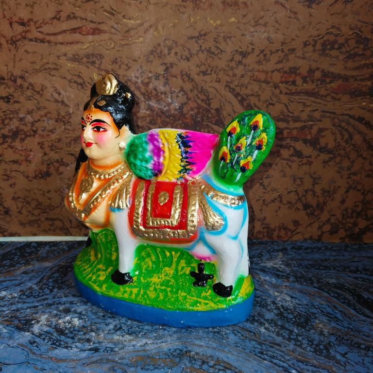 Handcrafted Kamadhenu Navaratri Golu Doll with vibrant colors and intricate details, symbolizing abundance and prosperity.