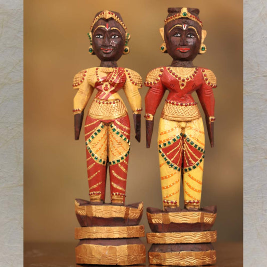 Marapachi Doll Set – Hand-Painted Wooden Couple Figurines in Yellow and Red with Traditional Detailing and Gold Highlights.