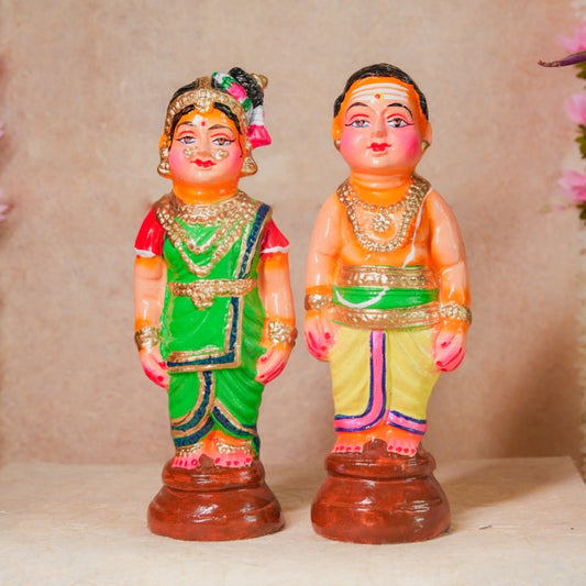Handcrafted Navarathri Golu Dolls Mama-Mami (Pattai) set depicting a traditional South Indian couple in vibrant festive attire.