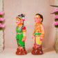 Handcrafted Navarathri Golu Dolls Mama-Mami (Pattai) set depicting a traditional South Indian couple in vibrant festive attire.