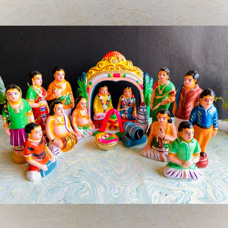 Handcrafted Navarathri Golu Dolls Marriage Kalyanam Set depicting a traditional Indian wedding with bride, groom, family, and musicians.