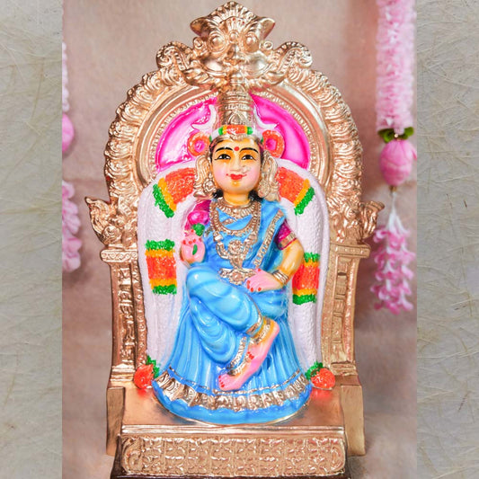 Kamalambigai Amman idol seated on a golden ornate throne, dressed in a blue saree with vibrant detailing, perfect for Indian festivals and home decor.