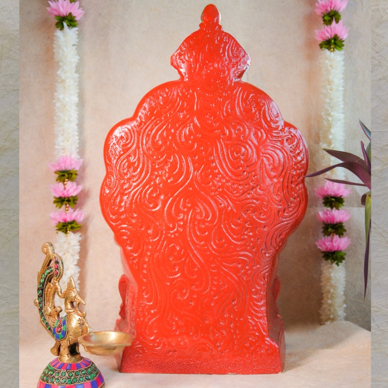 Handcrafted Navarathri Golu doll of Goddess Rajeshwari seated on a golden throne with vibrant pink and green accents.