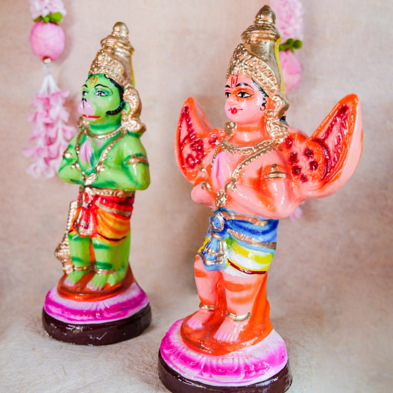 Navarathri Golu Dolls featuring Hanuman and Garuda, hand-painted with vibrant colors, representing devotion and strength.