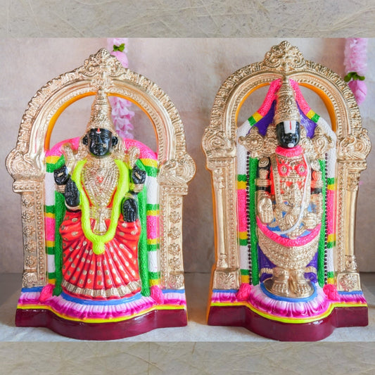 Navarathri Golu Dolls featuring Perumal and Thaayar seated within ornate arches, hand-painted with vibrant traditional colors.
