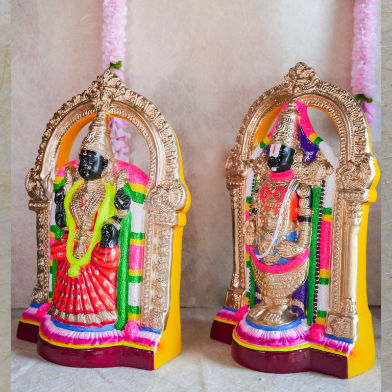 Navarathri Golu Dolls featuring Perumal and Thaayar seated within ornate arches, hand-painted with vibrant traditional colors.