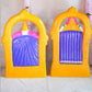 Navarathri Golu Dolls featuring Perumal and Thaayar seated within ornate arches, hand-painted with vibrant traditional colors.