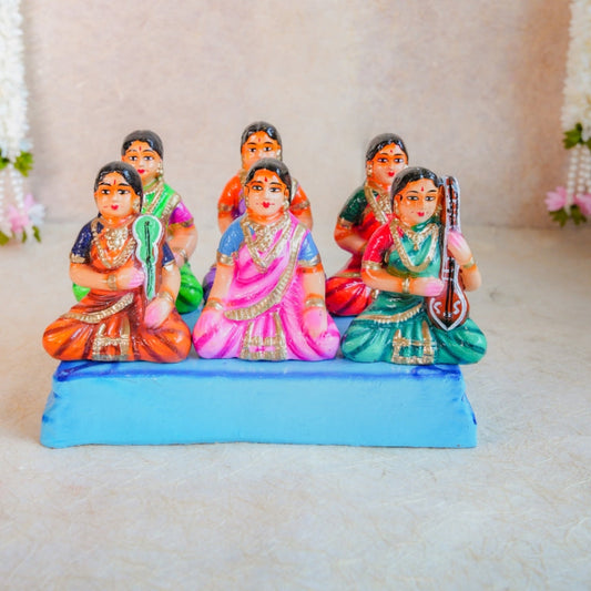 Navarathri Golu Dolls Katcheri Set with vibrant figurines of singers and musicians seated on a platform.