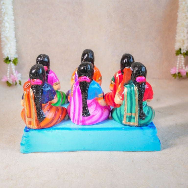 Navarathri Golu Dolls Katcheri Set with vibrant figurines of singers and musicians seated on a platform.