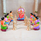 Handcrafted Navarathri Golu Dolls Lakshmi Vilakku Poojai set featuring Goddess Lakshmi, devotees, and traditional lamps in vibrant colors.