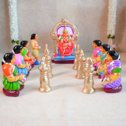 Handcrafted Navarathri Golu Dolls Lakshmi Vilakku Poojai set featuring Goddess Lakshmi, devotees, and traditional lamps in vibrant colors.