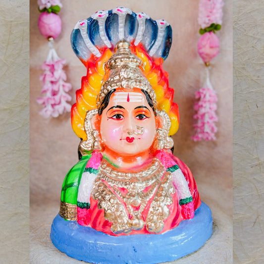 Hand-painted Navarathri Golu Doll of Karumari Amman Bust with vibrant colors, cobra hood, and traditional ornamentation.