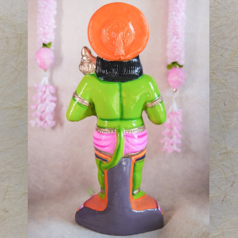 Hand-painted Navarathri Golu Doll of Lord Hanuman holding a Gada in vibrant green with detailed embellishments.